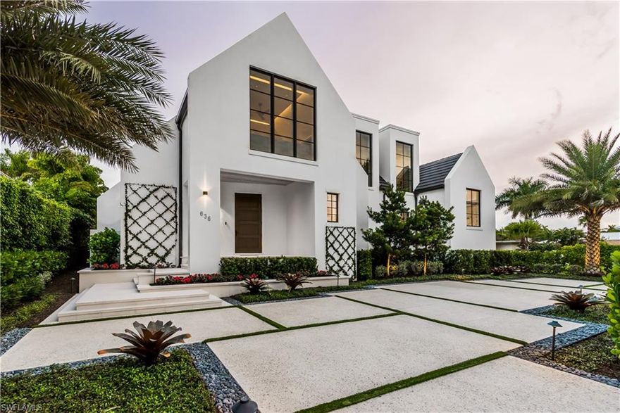 Newly built custom home designed by Harrell & Co Architects and Laura Hay Decor and Design is located just blocks from 3rd St. South and the Gulf of Mexico's white sand beaches.  This home offers four bedrooms with en-suite baths and two half baths, a den, and three car garage.  The open concept interior includes custom cabinetry and millwork, Wolf and Subzero appliances, floor to ceiling glass and architectural ceiling detail throughout opening to a large outdoor living area complete with a summer kitchen overlooking the pool and spa. There is an oversized sun/lounge area with artificial turf for sunbathing taking advantage of the Southern exposure. Other highlights of the home includes Moncer European oak floors throughout, Lurton lighting system, elevator, Lurton shades on all windows, temperature controlled wine room, whole house generator, natural gas and electric roll down screens and shutters. Located on one of Olde Naples most desired streets!