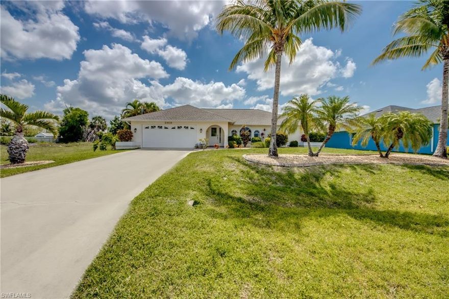 Welcome to your private oasis in SW Cape Coral! This beautifully maintained 3-bedroom, 2-bath pool home sits on an eastern-exposure lot in a quiet residential neighborhood, offering sunny mornings and shaded afternoons on the lanai. 

Step inside to an inviting open floor plan with tile throughout and plenty of natural light. The living and dining areas flow effortlessly to the screened, paved pool deck through wide sliding doors—perfect for everyday living and easy entertaining. The spacious primary suite features its own sliders to the pool area, a walk-in closet, and an updated bathroom. Both bathrooms have been remodeled and modernized, giving the home a clean, move-in-ready feel.

The kitchen is fully equipped with stainless steel appliances, granite countertops, and ample cabinet and counter space so you can cook and host with ease. Outside, enjoy a newer pool (2010), new roof (2022), new AC (2020), and a fully fenced backyard that provides privacy and room for pets, gardening, or play.

Whether you’re looking for a full-time residence, seasonal retreat, or investment property, this well-cared-for home delivers the SW Cape lifestyle—close to everything yet tucked away on a peaceful street. The house comes turnkey so it's move-in ready. Come see why living in SW Cape Coral is so easy to love!