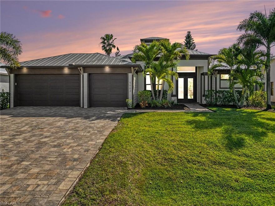 Welcome to this beautifully maintained home nestled in one of Cape Coral’s most desirable neighborhoods just minutes to Cape Harbour and premier marinas, with effortless access to some of Southwest Florida's best boating and waterfront destinations, and vibrant downtown Cape Coral! This immaculate property offers exceptional curb appeal and luxury features throughout.
Step inside to discover a spacious open layout enhanced by elegant finishes and modern comforts, including electric blinds for effortless style and convenience. The gourmet kitchen flows seamlessly into the living space, perfect for entertaining or relaxing with family and friends.
Outdoors, your private oasis awaits. Enjoy a gorgeous heated saltwater pool surrounded by lush privacy landscaping that creates a secluded, tropical retreat. The picture perfect screened lanai features a full outdoor kitchen, ideal for Florida living and year round entertaining.
Additional highlights include a durable metal roof with a decorative cupola, a three car garage with epoxy floors, and meticulous attention to detail inside and out. This home truly shines with pride of ownership.

Ideal for those seeking to relocate or for investors looking for a desirable vacation rental opportunity. Don’t miss your chance to own this exceptional property in one of Cape Coral’s most sought after areas!