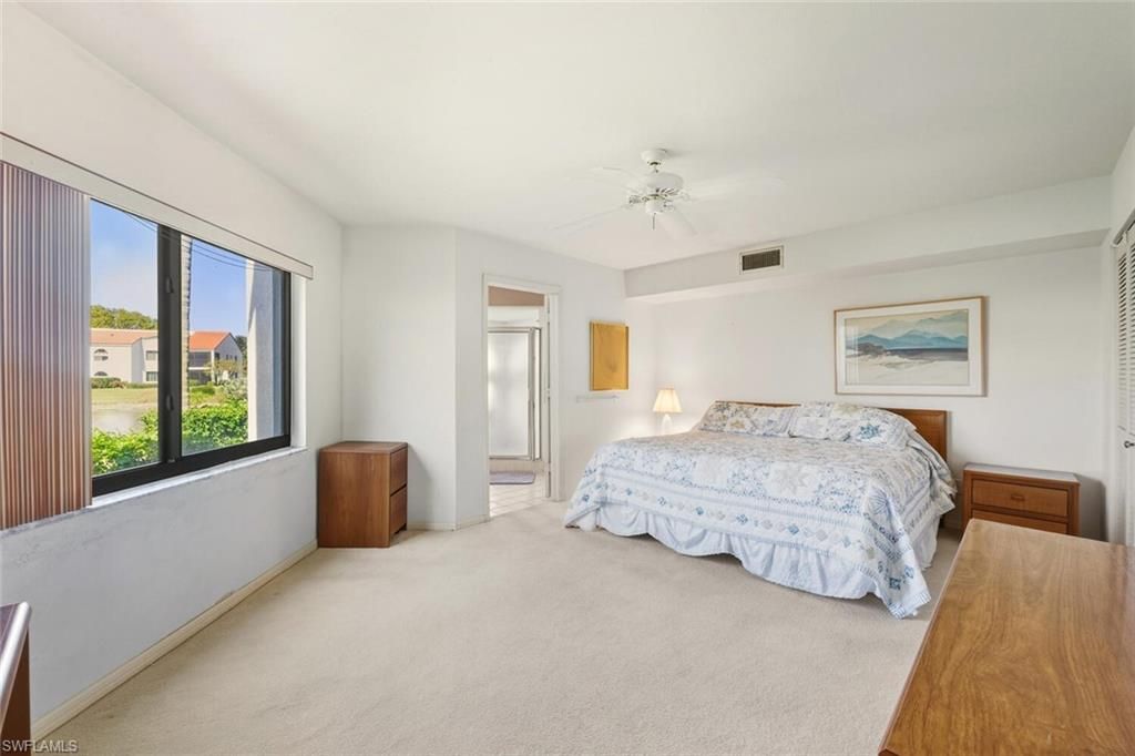 Photo of 613 Beachwalk CIR #J-102, NAPLES, FL 34108 (MLS # 226007011)