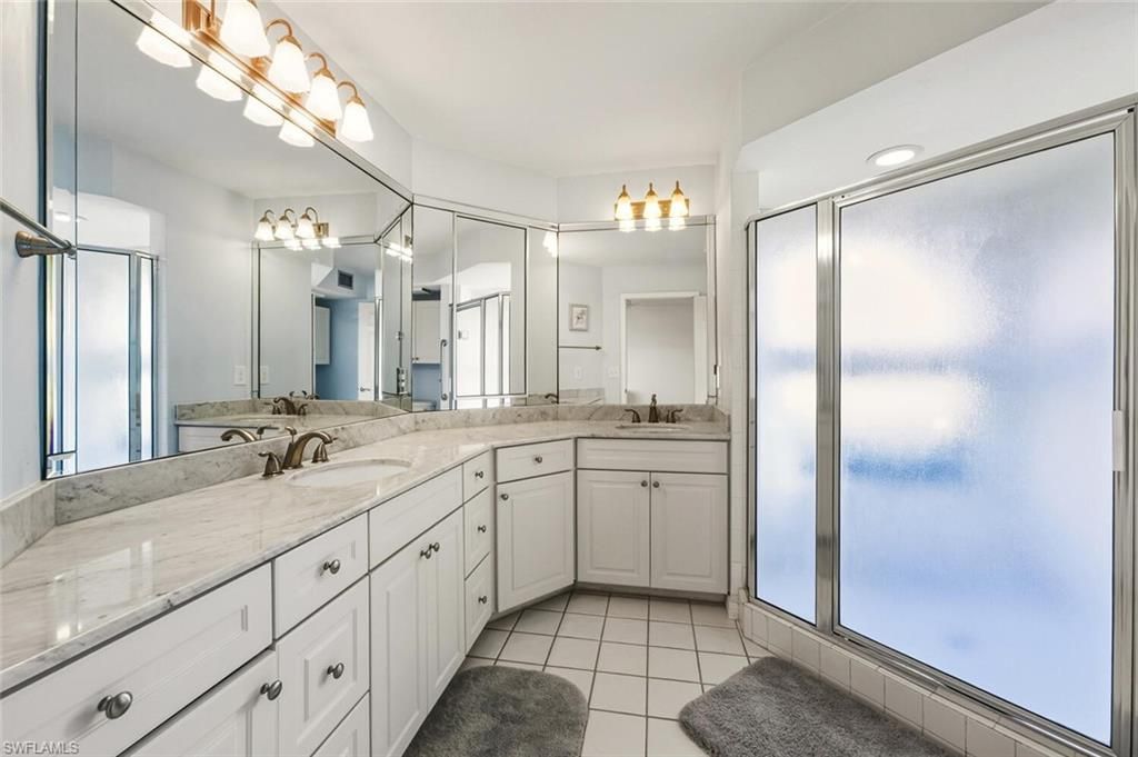 Photo of 613 Beachwalk CIR #J-102, NAPLES, FL 34108 (MLS # 226007011)