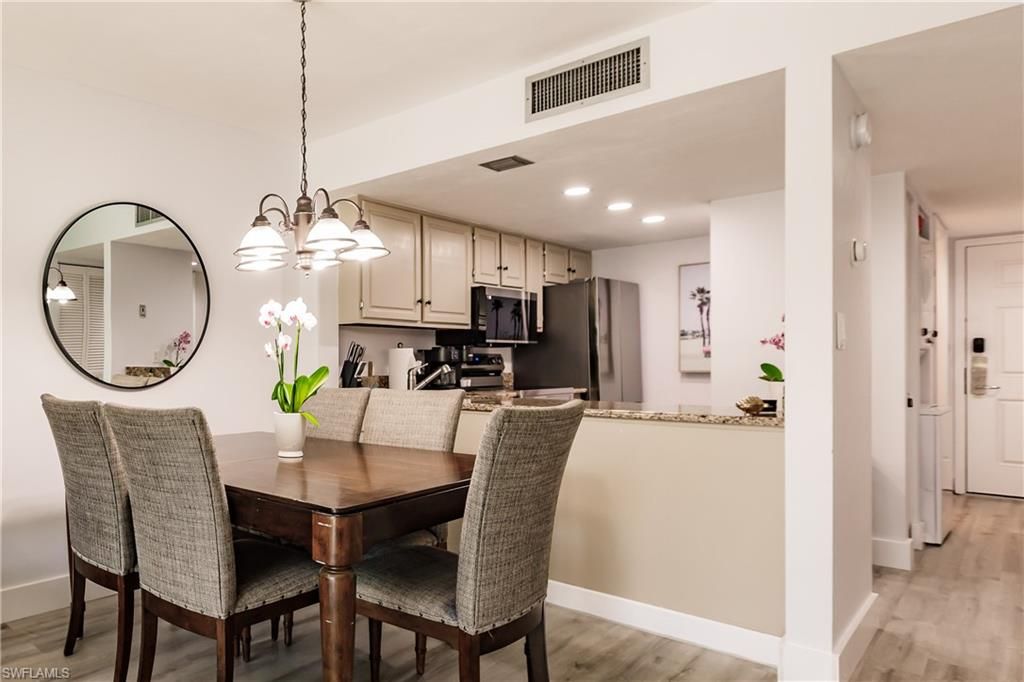 Photo of 600 Neapolitan WAY #152, NAPLES, FL 34103 (MLS # 226018836)