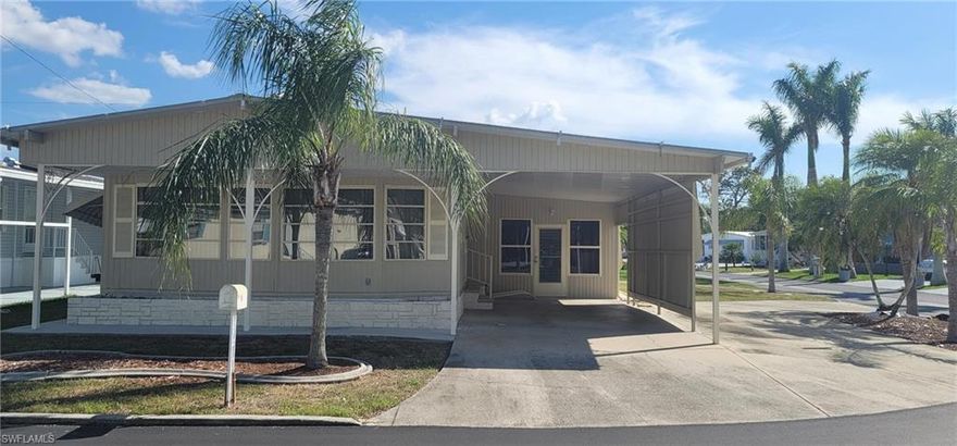 JUST REDUCED!  Large 2 BR/2.5 BA Manufactured Home in Carriage Village.  Kitchen has breakfast bar with large pantry and lots of cabinets. Plenty of closets including a walk-in closet in Owners bedroom and two closets in the guest room.  Guest Bedroom can be divided into two rooms if wanted.  Spacious Florida Room with AC.  Situated on a corner lot with circular driveway for extra parking space.  Utility Room has Washer, Dryer, Utility Sink, Refrigerator with extra storage area.  Awnings around home.  With some TLC this would be a great home.  OWN YOUR LAND in this 55+ active, pet friendly community.  Monthly Maintenance Fee is only $77.  Community has a large heated pool, clubhouse, hobby shop, library, billiards room, shuffleboard, bocce ball, ceramics, putting green, dances and so much more.   Enjoy the FLORIDA LIFESTYLE!