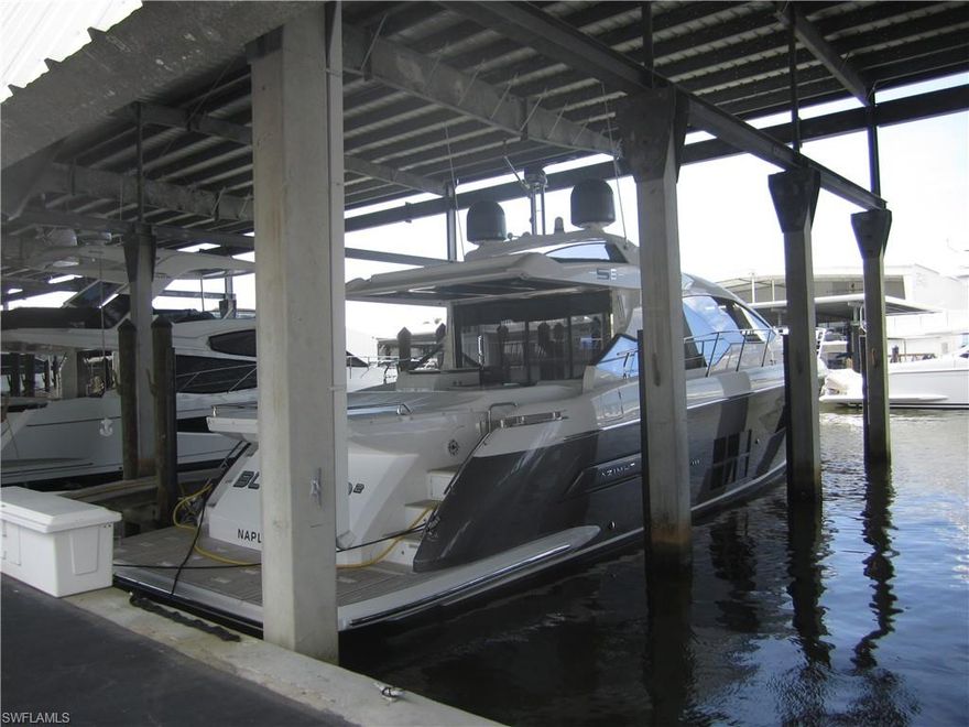NAPLES Finest Marina! Gated, Covered, 24 hour security. Walk to 5th Ave after a day of boating.