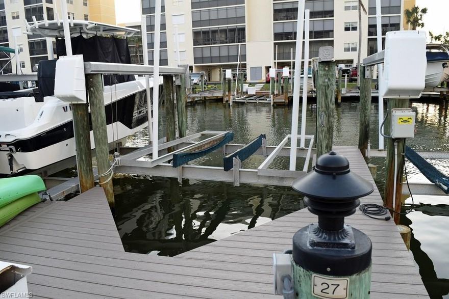 Dock completely rebuilt with composite decking approximately 2 1/2 years ago.  Casa Marina's convenient location means you could be boating in the open waters of the Gulf of Mexico in approximately 15 minutes or travel Estero Bay to our fun north end waterfront restaurants, bars, etc. Estero Bay fishing is only minutes away. Water and electric. Approximate 10,000 lb. lift; buyer to verify.  Annual Casa Marina II Boating Association fee: $1000.00. 2023 taxes: $370 (approx.). Sales application fee: $75. Must be an owner in Bay Beach Community to purchase.