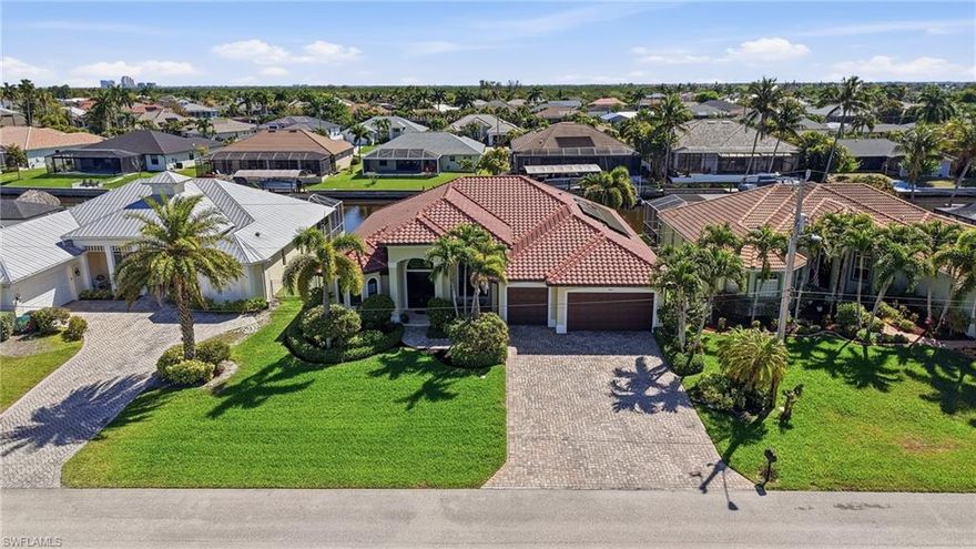 Gulf Access Pool Home with 3-Car Garage and walking distance to 4 Mile Cove Ecological Preserve!

Luxury waterfront living awaits at this stunning Gulf access home in desirable Southeast Cape Coral. Built in 2013 and offering nearly 2,900 sq ft of living space, this spacious residence features 4 bedrooms, 3 bathrooms, a 3-car garage, and Gulf access—perfect for boating enthusiasts seeking the ultimate Florida lifestyle.

Inside, the open floor plan showcases expansive living areas with beautiful tile flooring throughout, creating a bright, modern feel with low-maintenance durability.  Solid wood cabinets and granite countertops!!  The large living and dining spaces flow seamlessly toward the outdoor lanai, making the home ideal for entertaining or relaxing with family and friends.

Step outside to your private screened pool overlooking the canal, where you can enjoy peaceful waterfront views, sunny afternoons, and evening swims. With Gulf access from your backyard, boating, fishing, and sunset cruises are always within reach.

Additional highlights include a new air conditioning system, generous storage, and a highly desirable three-car garage for vehicles, water toys, and equipment.

Located in Southeast Cape Coral and only a short walk to the Four Mile Cove Preserve and the Veterans Memorial Area.  This home is also close to shopping, dining, schools, and major roadways, this Gulf access pool home offers the perfect combination of luxury, convenience, and the Southwest Florida boating lifestyle.
