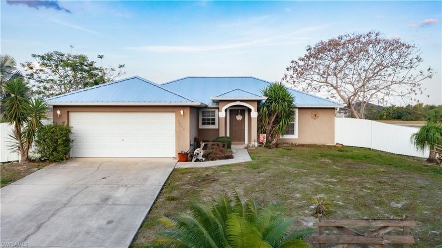 Wow! This home truly has it all—an inground caged pool, a fenced backyard, a greenbelt behind the property, and even the adjacent lot available for additional space or future expansion. Situated in an established neighborhood of newer homes in a rapidly growing area of LaBelle, this property offers convenience and comfort. It’s close to schools, including Florida Southwestern State College, as well as parks—making it an ideal family home. Inside, you’ll find tile flooring in the main living areas, a cathedral ceiling, and plenty of storage throughout. No HOA and not located in a flood zone!