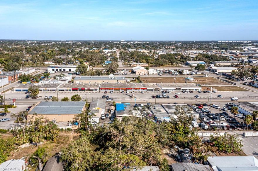 2203 is located directly across the street from the NEW City of Fort Myers Police and Administrative Complex. 
 AS IS, it generates a 4.08% CAP RATE. 73% Occupancy. OR, OWN THIS CITY BLOCK and MAKE IT WHAT YOU WANT IT TO BE.  Includes an anchor tenant for a total of 11 tenants and a vacant lot. There is tremendous upside on this property located near several Fort Myers redevelopment zones and near City of Palms Park. When you can own or redevelop an entire city block, what's not to like about this investment property? Re-paving of parking lot is permitted and imminent.  Seller Financing available.