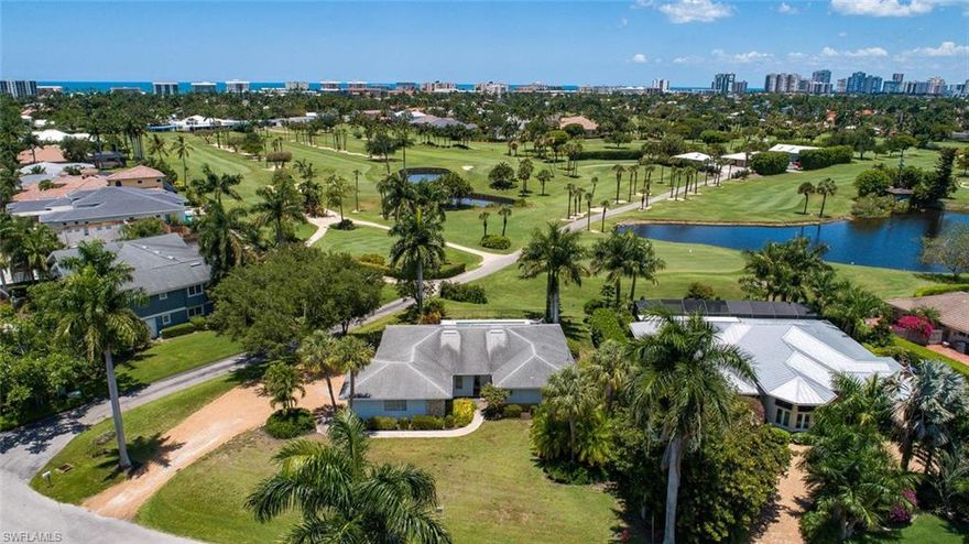 H.14597 - This is a prime location on the Moorings Country Club golf course with an awesome view over the widest part of the course. The property is being offered at its lot value, however it is a comfortable home that has been continuously rented since 2001.The home is being offered "AS IS". This area of The  Moorings is popular for new homes being built. Several on Wedge Drive have been replaced with spectacular new homes. Not many opportunities like this left in the City. You can buy it now and continue to lease it until you're ready to start your dream home.