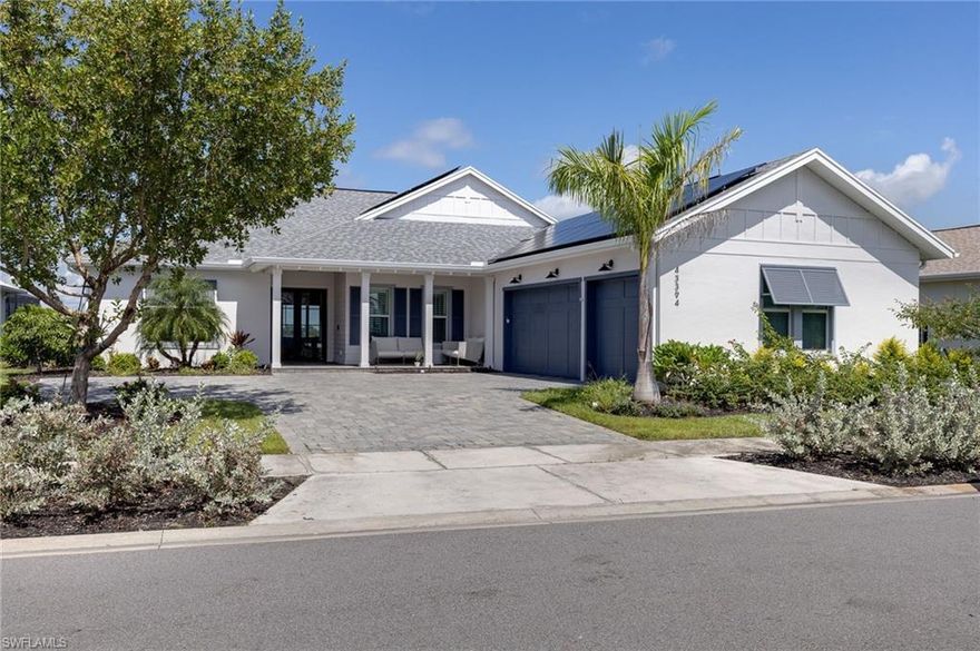 Stunning lakefront home in Lake Babcock Estates, Babcock Ranch’s most sought-after location! Enjoy breathtaking views of the lake and Founder’s Square from your backyard. This fully renovated 3-bedroom + den residence showcases a custom chef’s kitchen with Taj Mahal brushed quartzite countertops, panel-ready Fisher & Paykel appliances, and European-imported custom cabinetry. Designed for modern living, the open floor plan offers seamless indoor-outdoor flow, ideal for entertaining. Additional upgrades include a new 5-ton A/C, new pool water heater, tankless water heater, Tesla charger, and premium plumbing fixtures. A rare opportunity to own a premier homesite in America’s first solar-powered town!