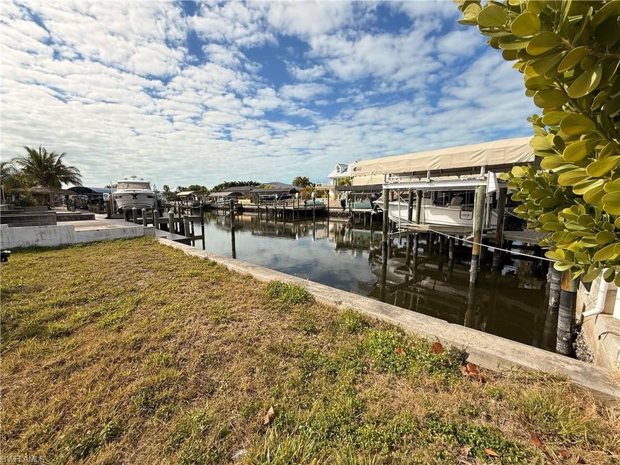 Stop dreaming and start building! This is a nearly impossible-to-find TRIPLE LOT located in the heart of St. James City on the beautiful Pine Island. This expansive property offers significantly more frontage and buildable area than standard island lots, allowing for a substantial custom residence, multi-vehicle garage, and extensive outdoor living space. Plenty of space for a custom boat dock with GULF ACCESS!