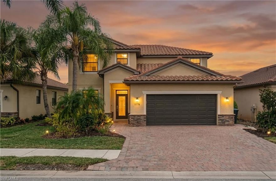 This Gorgeous home is MOVE-IN READY!! With Luxury Vinyl Plank flooring throughout, clean-up is effortless! This home also offers a 2022 replaced A/C, NEW Washer/Dryer, and newly painted interior! 1 bedroom and bathroom are downstairs. The primary suite and two additional guest rooms are upstairs, along with incredibly spacious bonus room! Beautiful heated pool (NEW HEAT PUMP) with a huge backyard and WATER VIEW. The home is fully fiber optic wired. No need to worry about cable or wi-fi interruptions. This state-of-the-art technology is paid for through the HOA. Located close to the amenity center, you'll experience the natural bond of the neighbors with consistent planned gatherings in this tight-knit community. Reflection Isles borders the 2,000-acre Six Mile Cypress Slough Preserve! Enjoy basketball, tennis, community pool/spa, clubhouse, fitness center & tot lot. This community has a social committee & is always planning fun for all ages! Close to shopping, I-75 & airport!