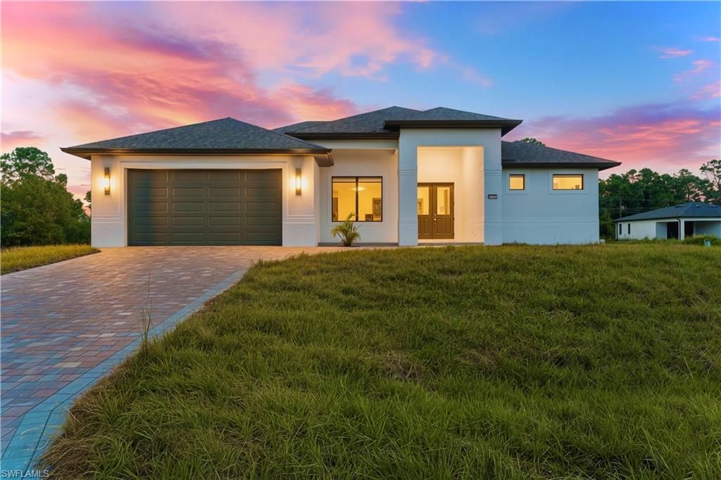 Photo of 5230 3rd ST W, LEHIGH ACRES, FL 33971 (MLS # 2025018310)