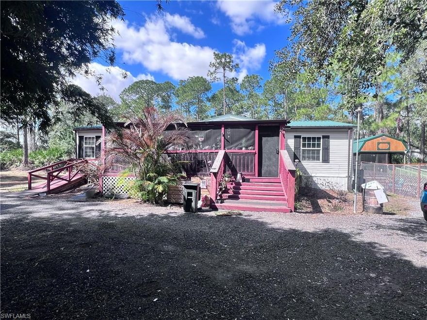 Private 1.25-Acre Retreat in Montura Ranches – Clewiston, FL
Tucked among mature trees in the peaceful community of Montura Ranches, this 1.25-acre property offers privacy, space, and versatility. The 2004 double-wide manufactured home features 3 bedrooms, 2 bathrooms, and approximately 1,404 square feet of comfortable living space. A metal roof installed in 2017 provides durability, and all appliances have been updated in recent years for added convenience.
The home is set back and nearly hidden from the road, creating a truly private setting surrounded by natural beauty. In addition to the main residence, the property includes a detached mother-in-law suite/efficiency with a full bathroom and a spacious front porch, ideal for guests, extended family, or potential rental income.
A large metal workshop/garage offers ample room for storage, hobbies, or projects, making this property perfect for those who need extra space for equipment or recreational vehicles.
Located in Montura Ranches, residents enjoy the freedom of no HOA restrictions and plenty of room to spread out. With convenient access to both Southwest Florida International Airport (RSW) and Miami International Airport (MIA), travel is easy, and day trips to either Florida coast’s beaches are within reach.
If you’re looking for privacy, acreage, and flexibility in a rural setting, this property delivers exceptional value and opportunity.