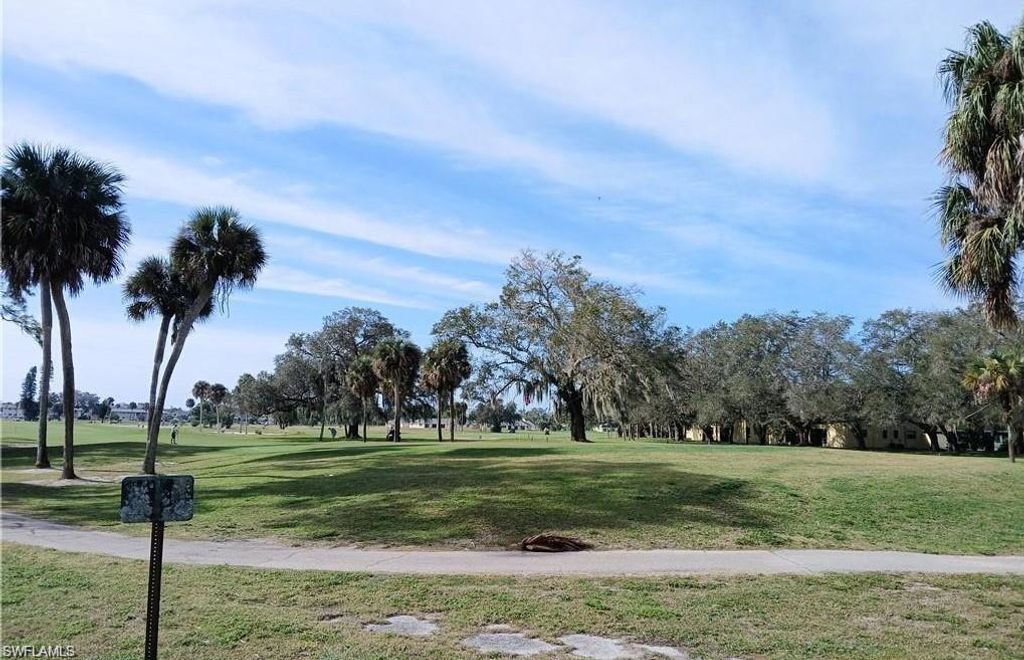 Photo of 2231 E 5th ST #106, LEHIGH ACRES, FL 33936 (MLS # 226019281)