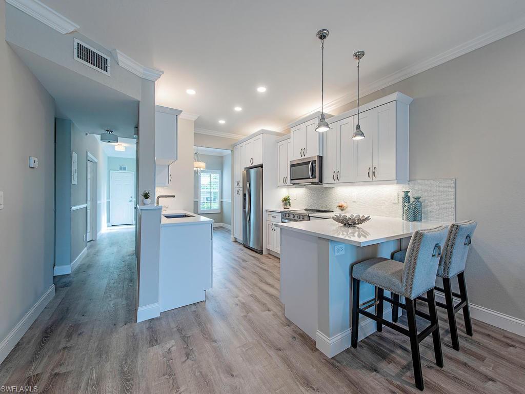 LAUREL OAKS AT PELICAN BAY - Residential