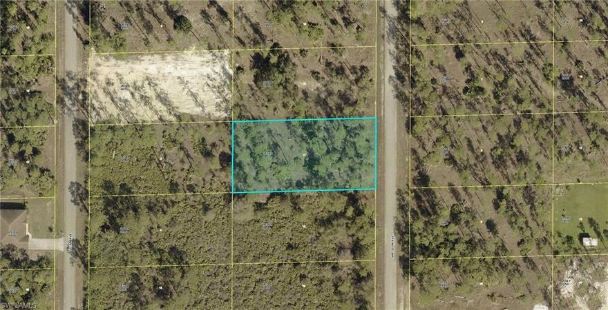 Nice half .50 acre lot in west of Lehigh Acres. This lot has great potential developers are boosting this area with beautiful and modern new constructions. Agents please read confidential notes.
