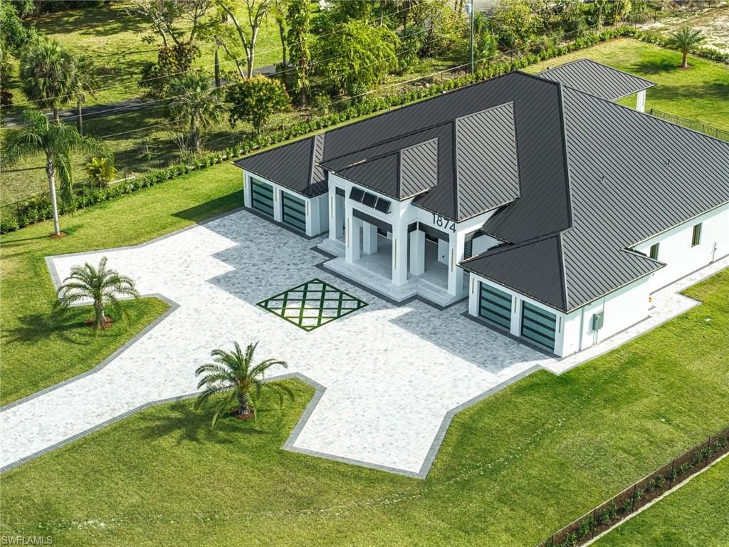 Photo of 1874 39th ST SW, NAPLES, FL 34117 (MLS # 226011424)