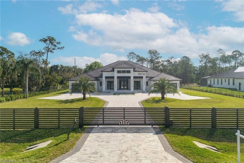 Photo of 1874 39th ST SW, NAPLES, FL 34117 (MLS # 226011424)