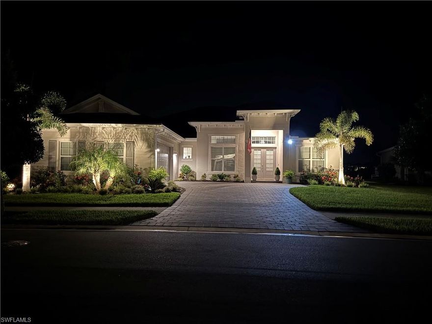 Welcome to luxury living at The National Golf & Country Club within Ave Maria, Southwest Florida’s premier master-planned community offering resort-style amenities and a true small-town feel. This 2023 Bougainvillea II Model saltwater pool home features 3 bedrooms plus a den and 3 full baths, thoughtfully designed with upscale architectural detail. Inside, you’ll find coffered ceilings, extensive crown molding, paneled feature walls in the great room, den, and dining area, and custom lighted built-in bookcases. Quartz countertops and designer tilework enhance the home’s refined style and quality craftsmanship. The lanai and custom saltwater pool/spa create exceptional outdoor living, complete with outdoor BBQ, al fresco dining space, professionally installed landscape lighting, and sweeping golf course, lake, and sunset views. Smart home features include a Ring doorbell, smart thermostats, integrated indoor and outdoor speakers, transferable security cameras, and hurricane shutters for added peace of mind. Located on a non-golf street with access to all community amenities, this residence blends architectural elegance, modern technology, and resort-inspired living.