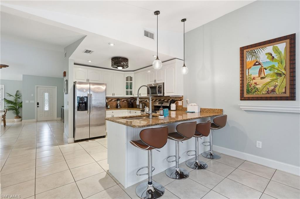 Photo of 2548 River Reach DR, NAPLES, FL 34104 (MLS # 226026965)