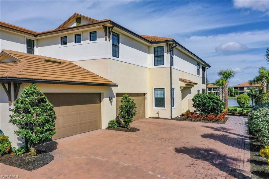 FIRST FLOOR CARRIAGE HOME WITH STUNNING LAKE VIEWS! 2 bedrooms ensuite plus a spacious den/office &      2-car garage. Beautiful outdoor space, screened in lanai, all tiled flooring with gorgeous LAKE VIEWS! Upgrades include crown moulding, hurricane impact windows and sliding glass doors. Custom Gourmet Kitchen with Quartz countertops, stainless steel appliances, white shaker cabinets, natural gas range and a large walk in pantry. Extended tile flooring out to the lanai. Club LaMorada offers residents a 13,700sf lakefront clubhouse featuring an array of amenities set in an intimate community of only 343 homes. Fitness center, aerobics studio, tennis, pickle ball, bocce & a fabulous resort-style pool and spa. A clubhouse theater, culinary arts center for cooking demonstrations and wine tastings, and an outdoor bar area offers residents a beautiful Naples lifestyle! NO CDD, LOW FEES!.