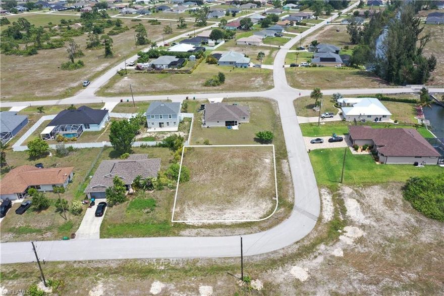 Prime corner lot ready for your vision! This outstanding piece of land offers the perfect canvas to build your dream single-family home in a vibrant and growing community. Enjoy the benefits of no HOA restrictions or fees and a low-risk Flood Zone X. Conveniently located near parks, fine dining, shopping, and recreational amenities, this corner lot is perfect for creating your ideal space or making a valuable investment. Don’t miss this fantastic opportunity to shape your future in Cape Coral!