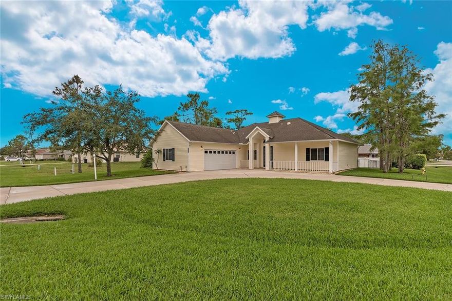 This charming home is the ONE!  Located in a quiet neighborhood, just off Paradise Road and centrally located.  You will fall in love with this 3 bedroom, 2 bath home located on a large corner lot.  With a fenced in backyard, no HOA fees and a great floor plan this could very well be the home you have been waiting for!  Vaulted ceilings, large rooms, freshly painted, tile throughout, oversized lanai, large garage, upgraded sprinkler system with rain sensor, DESIRABLE neighborhood -- don't miss this opportunity!  Close to the world famous Barefoot Beach, restaurants, The Coconut Point Mall, Naples, Fort Myers, and the International Airport!  Move in ready and waiting for its' new homeowners, this home could be your piece of paradise in Southwest Florida!