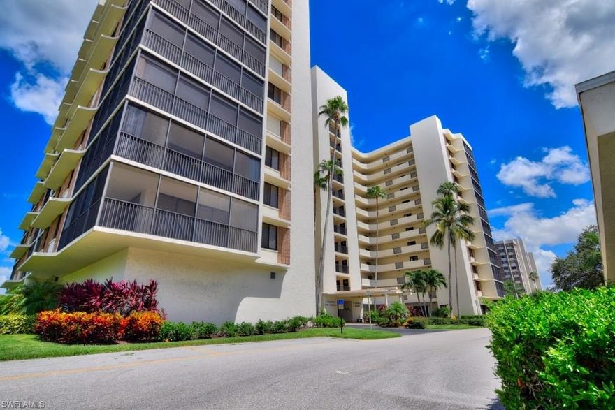 Enjoy spectacular sunsets from this beautifully updated 2 bedroom 2 bath beach condo. With updated kitchen and abundant natural lighting you'll love the feel of this spacious home. Watch the dolphin play from your wrap around lanai or catch a sunset over the gulf. This unit has it all just a short walk to one of Naples best beaches, a large pool, tennis courts, a marina for your boat or kayak (lease required) covered parking and a community room to meet new friends. As if this isn't enough this community is only a short distance from Mercato, the Ritz, the Artis and an almost endless amount of shopping, dinning and entertainment.