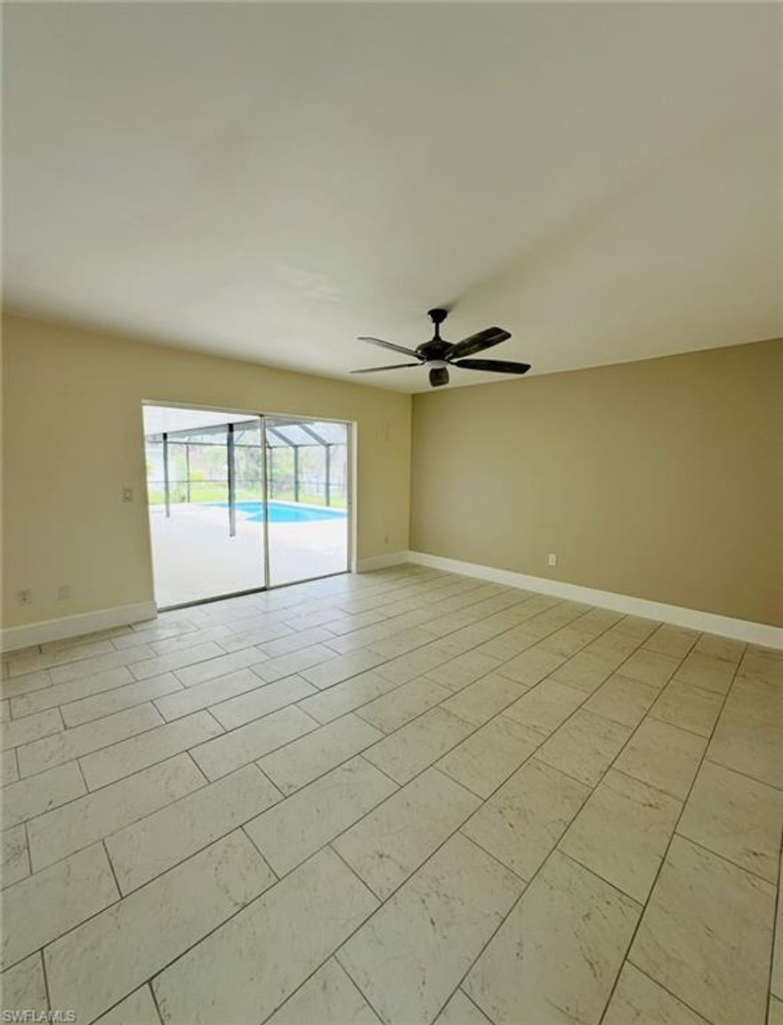 LEGANTLY MAINTAINED POOL HOME JUST A BLOCK AWAY FROM CHARLOTTE HARBOR AND SUNSEEKER RESORT. This residence features a beautifully updated open floor plan, enhanced by an abundance of sliding glass doors that invite natural light, creating an atmosphere conducive to both comfort and elegant entertaining. The spacious kitchen is a culinary enthusiast's dream, offering ample counter space, a generous pantry, a breakfast bar, and a formal dining area. The living areas are designed for relaxation and enjoyment, featuring ample space for furnishings and leisure activities. The expansive master suite includes direct access to the lanai, along with a master bathroom. Indulge in the sun on the expansive screened lanai, complete with a pool, or take a leisurely stroll to the waterfront where you can dock your boat at your private dock. Please note that this property is not furnished.