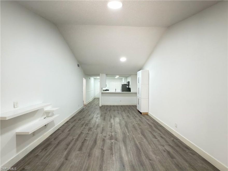 Beautifully remodeled 2-bedroom, 2-bath condo on the second floor in a quiet boutique community with low HOA fees in Naples. This unit features new kitchen cabinets, granite countertops, stainless steel appliances, new tile flooring, and fresh paint throughout. The ceilings have been refinished for a clean, modern look.
The spacious primary suite offers a walk-in closet and great natural light. A separate oversized laundry room includes a washer, dryer, and extra storage. Enjoy a private screened lanai overlooking a peaceful area.