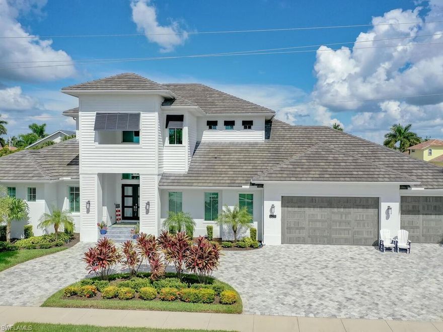 SELLER TO CREDIT BUYER $50,000 FOR BOAT DOCK. Welcome to this beautiful, two-story, coastal contemporary home located in the Tigertail area. This home sits just 2 blocks from the entrance to Tigertail Beach! 609 Hernando sits on an oversized, 125 foot wide lot which allowed the home to be built with a comfortable 4,100 square feet under air. For the car enthusiast or someone looking for extra storage, the home has an oversized garage which can fit 4-5 cars and the garage is air conditioned with a mini split. Coming inside the home, one will be impressed with the four large bedrooms plus a den and each of the bedrooms has an en suite bathroom. The home has been finished with a gourmet kitchen that includes two islands, custom cabinetry and a hidden walk in pantry room. Looking around both inside and out, one will see countless upgrades, some of which include a Generac whole house generator, plantation shutters, automated IOT blinds throughout the home, impact doors and windows throughout and two summer awnings. Please note the full list of upgrades in the attachment to the listing. This home is truly a must see.