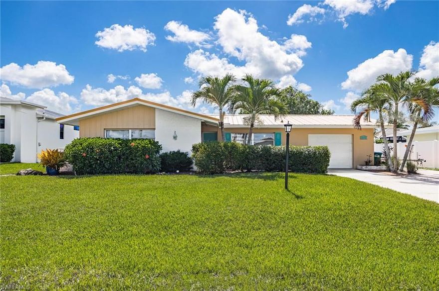 DIRECT SAILBOAT ACCESS, NO BRIDGES!! Bring your buyers or investors because this highly updated waterfront gem that's minutes to the Caloosahatachee River and the Gulf of Mexico won't last. As you walk into this 3 bedroom 2 bath home situated on a quite dead end you will be greeted by an amazing view of the newer pool through massive sliders, the lanai and the boat dock with two lifts,  canopy and remote controls. Inside this tastefully furnished turnkey split floor plan home you will find all of the most wanted items. Granite counters, stainless steel appliances, crown molding, tile on a diagonal(no carpet), updated bathrooms , tons of under truss living area and a paver side driveway that will fit all of your water sports toys. Recent updates include a water heater in 2022, pool/lanai, irrigation, a/c, repipe, metal roof, pool heater and more in 2015. Don't let this picture perfect direct gulf access slice of paradise slip through your finger tips!