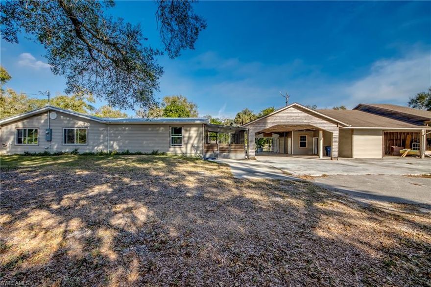 Discover your own private retreat! Tucked away on a charming 1-acre lot, this hidden gem is surrounded by majestic oak trees and fruitful landscaping, creating a peaceful setting the moment you arrive. Step inside to a warm, inviting home with a surprisingly spacious layout—offering 3 bedrooms, 2 bathrooms, and just under 1,700 sq. ft. of comfortable living space. The primary suite features an oversized walk-in closet, giving you all the storage you need. The updated kitchen shines with stainless steel appliances, while tile and vinyl flooring throughout the home mean no carpet to maintain or replace. Major upgrades provide peace of mind, including a 2018 metal roof, new windows installed in 2022, and a 2023 AC unit. Even the well and well pump were replaced just six years ago, ensuring long-term reliability. Outdoors, enjoy the serenity of a tranquil koi pond, and take full advantage of the 5+ covered parking spaces plus a workshop/garage—ideal for hobbies, dry storage, or keeping all your toys protected. There's more than enough space to park a boat or RV, and the fenced-in yard with a gated entrance offers both privacy and security. Room for Barn, Stalls, and much more. Conveniently located near I-75, this property is perfect for first-time buyers or anyone looking to downsize without sacrificing comfort or freedom. Opportunities like this don’t come often—schedule your tour today and see what makes this property truly special!