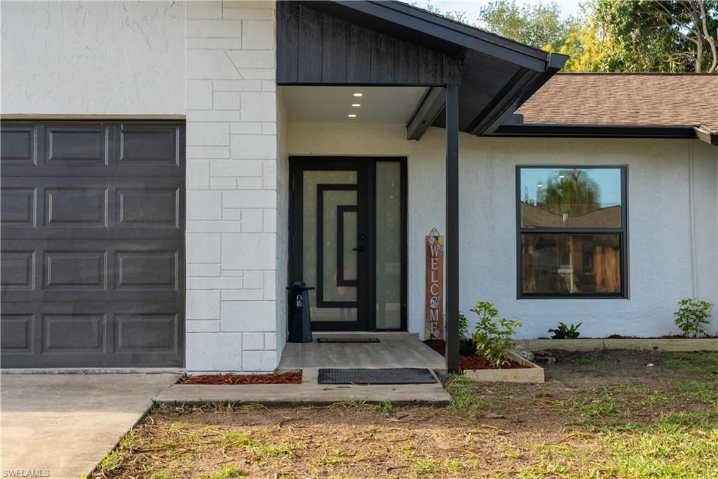 Photo of 4528 26th AVE SW, NAPLES, FL 34116 (MLS # 226011950)