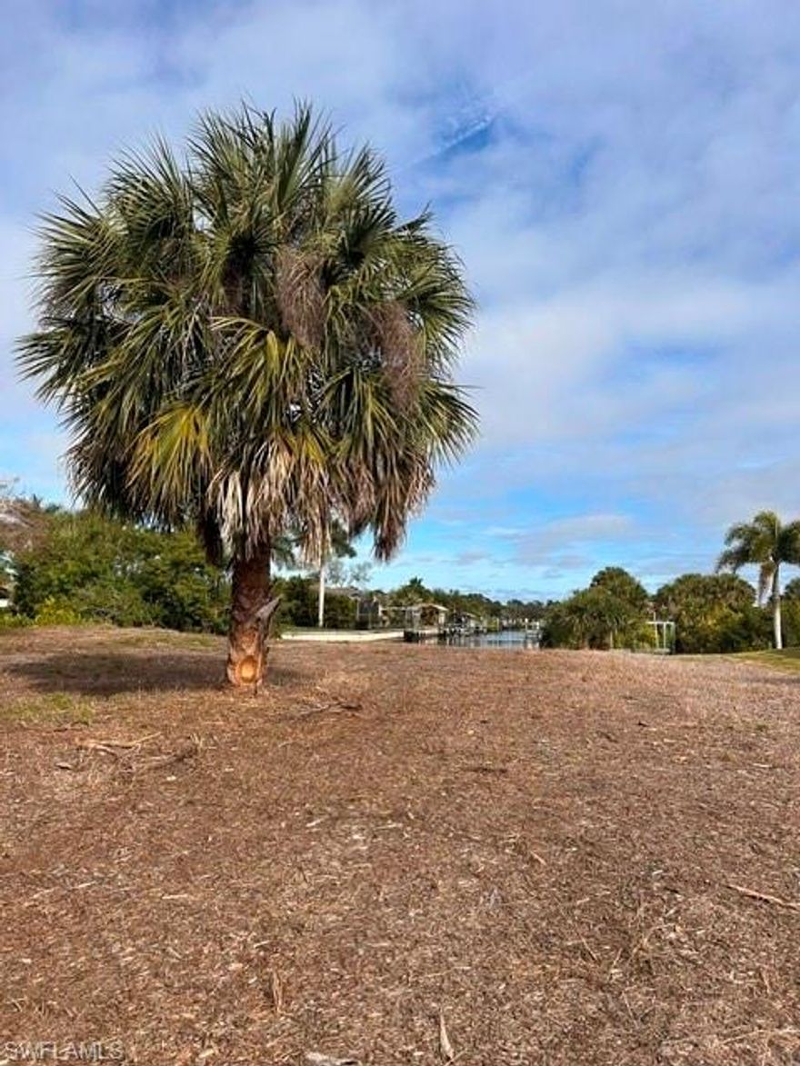 Dreaming of the perfect waterfront getaway? Look no further! This prime Port Charlotte lot is your golden ticket for building the home you'vealways wanted. Picture this: a private seawall, your very own boat dock and lift, and direct access to the beautiful waters right from yourbackyard. Whether you're into boating, fishing, or just soaking up the Florida sun, this spot has it all. Plus, the property already has power on-site, so you can dive straight into construction without any delays. It’s a fantastic opportunity for builders, investors, or anyone eager to createtheir dream space. Nestled in a well-established waterfront neighborhood. So, why wait? Your dream home is just a blueprint away—make it areality in this sunny slice of paradise!