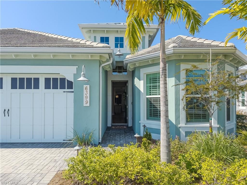 Photo of 6399 NEGRIL ISLE DR, NAPLES, FL 34113 (MLS # 226009325)