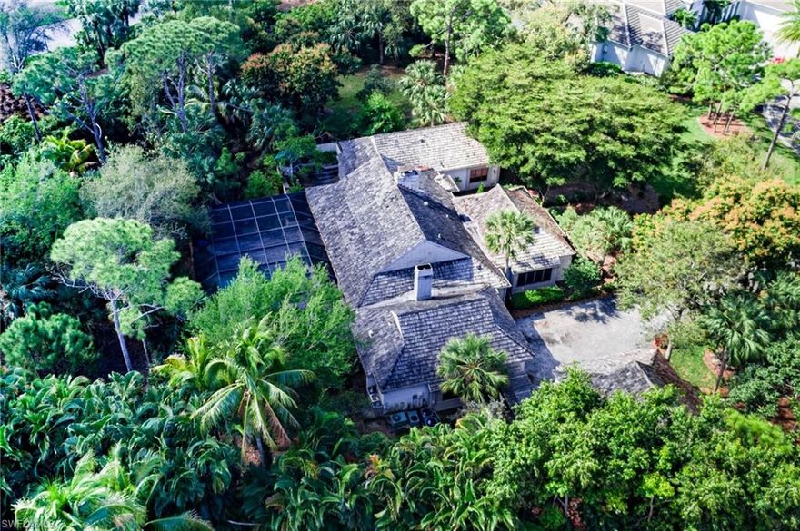 AMAZING opportunity to Renovate or Build your Dream Home or Family Compound in the heart of Naples!  Rare ONE ACRE lot in Pelican Bay Woods now available!  Pelican Bay offers Two Beach Restaurants, Full Service Beach Chairs and Umbrellas, Kayaking, Fitness Center, Tennis Courts, Learning Center, Walking Paths, and Biking Paths. The finest beaches, Art Centers, Shopping (Waterside Shops and Mercato), and Fine Dining are just minutes away from Pelican Bay!  Home being sold AS IS.