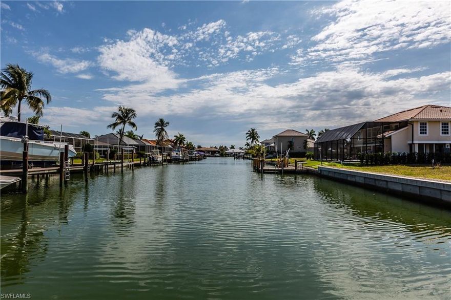 L.2414 - ATTENTION Boaters and builders! This oversized lot offers quick water direct access to the Gulf and Eastern exposure! Sewer assessment has been paid! Perfect location close to beach, restaurants and shopping. Don't wait any longer to build your dream home!