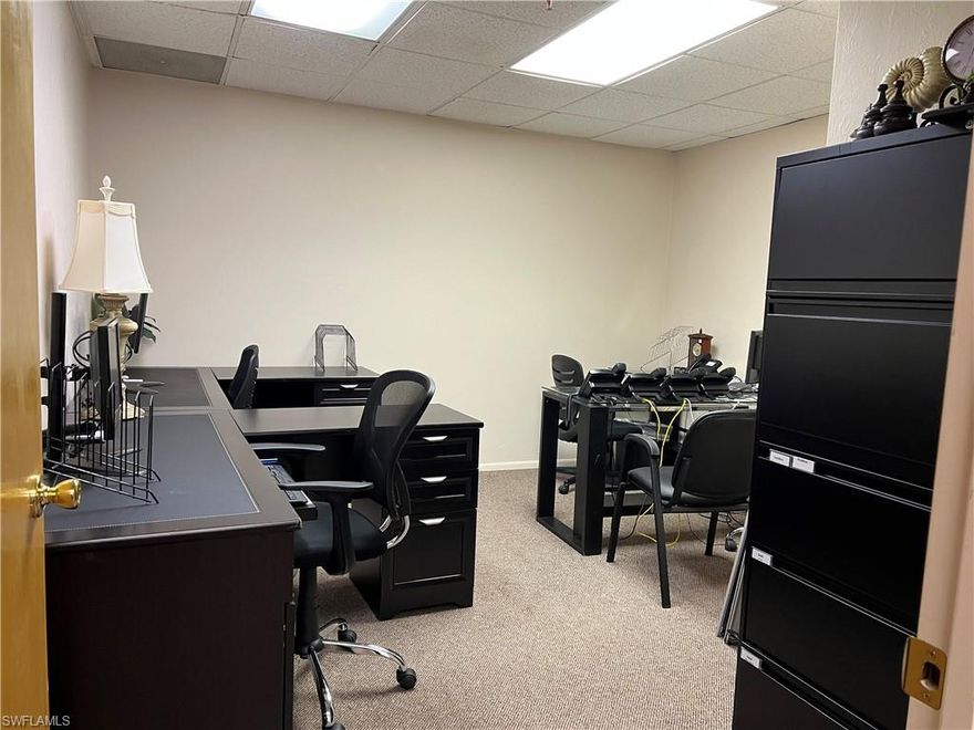 One of the most affordable executive office in Downtown Fort Myers. Located in the historic Edison Theatre building on Hendry St. Elevator on site. Executive office offers ample space and common break-room, bathroom, shared conference room. Office is shared with a real estate brokerage, perfect to compliment your business. No CAM fees.
Break-room features shared table, refrigerator/freezer, sink, and microwave.