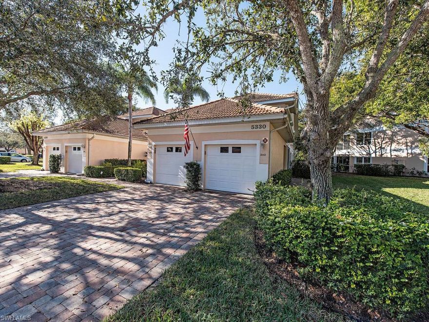 C.15898 - The view is a showstopper! The home has been beautifully and lovingly maintained from the tile floors throughout the living areas, the kitchen has many newer appliances and granite counters.  There are electric hurricane shutters on every window.  The water heater was replaced earlier in 2019.  The A/C is only a few years old.  The second lanai is enclosed to serve as an office/den and fully vented with A/C and heat. The carriage home is situated with a private view over the lake to a preserve and water feature. The garage floor has been sealed and the oversized driveway allows for extra parking. Carlton Lakes is an amenity rich community with several pools, fitness center with community center with library, fitness center with newer equipment.  Love tennis, bocce, walking and biking?  This is your new home. Carlton Lakes is one of the most pet friendly communities in the area.