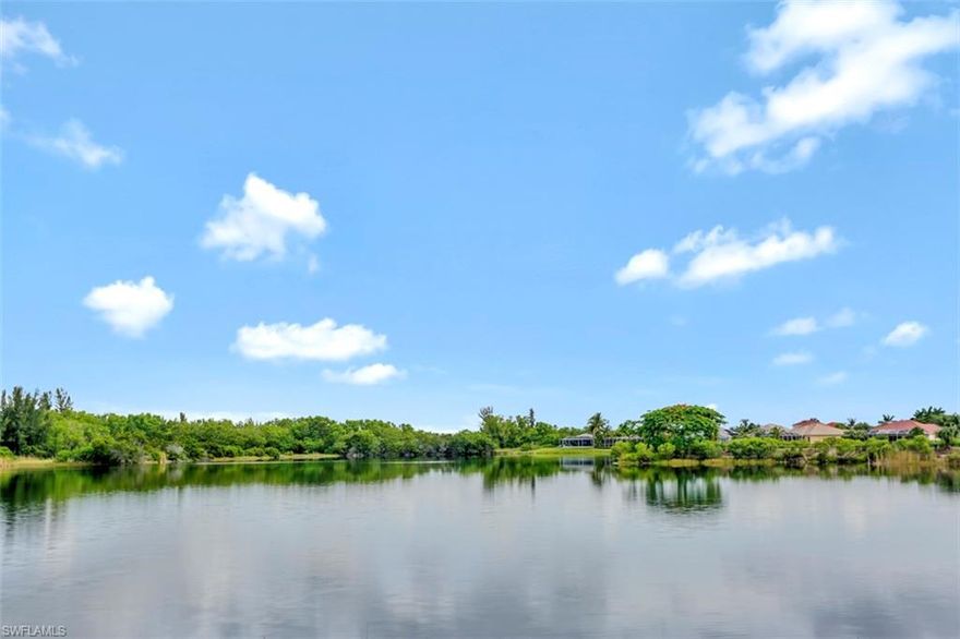 First floor condo with an amazing expansive lake view located in Sandoval, a gated community.  Live the Florida maintenance free lifestyle in this well maintained condo with two generous sized bedrooms and a bonus den/home office.  The kitchen offers ample counter space for food prep and entertaining with corian counter tops and wood cabinetry and is within steps of your formal dining area for those family gatherings or special occasions.  The master bedroom offers more spectacular views of the lake and is a dream to wake up to in the mornings!  The updated ensuite contains dual vanities with large walk-in shower with a river rock inlay and matching river rock shower floor, a rain shower  and two additional shower heads, it's your personal spa-like oasis.  The sellers have also installed a $4,000+ remote controlled drop-down hurricane shutter on back lanai for extra storm protection.  Enjoy all that this home has to offer along with all the community amenities.  Sandoval is centrally located right off Veteran's Pkwy just past Surfside with nearby shopping & restaurants.  Call to schedule your private showing today!