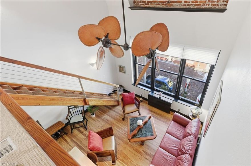 Fort Myers perfection! Can you imagine living in the heart of downtown in a chic, turnkey furnished condo with two years of HOA fees paid for in advance?  This 2 bedroom 2 bathroom condo has had a complete facelift.  Sleek cabinetry, air fryer station, new fridge with cocktail ice. Enjoy a beverage with abundant light streaming through your living room window, view a cotton candy sunset, and the city skyline right from the comfort of your own home!. This two story condo offers plenty of privacy with the primary suite on the top floor. Minutes away from the spectacular riverfront. Walk downstairs to enjoy monthly Art and Music Walks, Edison & Ford Winter Estates, the rooftop garden bar on top of the Luminary, Arcade Theater and shops, Coffee Shops, Restaurants, and much more entertainment!!!