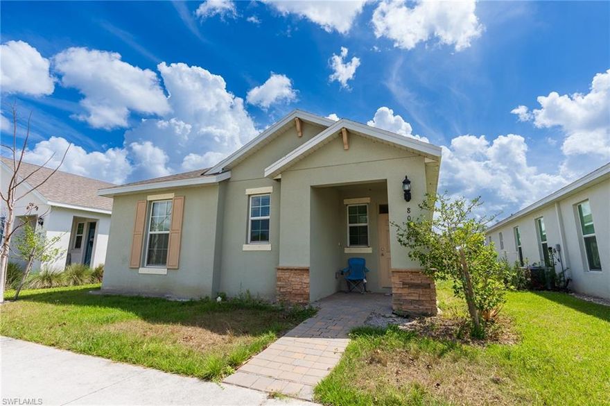 Beautiful 3-bedroom, 2-bath home in the heart of LaBelle offering 1,703 sq ft of living space. Features include quartz countertops, designer cabinetry, walk-in pantry, open living and dining area, and a covered lanai. The private primary suite includes a double vanity, walk-in closet, and tiled shower.