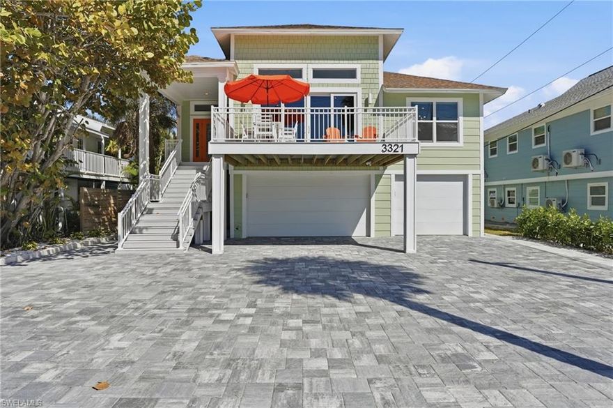 Experience elevated coastal living in this beautifully updated beach cottage boasting 5 bedrooms and 4 1/2 baths, including 4 beautifully appointed ensuite retreats. Light-filled interiors showcase upscale finishes, designer touches, and a seamless open-concept layout ideal for entertaining large groups or extended family stays. The outdoor living experience is equally impressive, featuring an oversized resort-style pool, expansive sun deck perfect for relaxing or hosting guests. The impressive Great room offers ample room for extended families to enjoy Coastal living at its finest. All upper bedrooms have slider rear door opening to a rear screened porch with direct access to the pool deck via a spiral staircase. The Pool has a heater for cool months and a chiller for the hotter months. The pool side recreation area is fully screened in with an entertainment area and pool table. It also features a view across the street to the beach. The house is wired for an electric generator. The property has a 200' deep well for irrigation and pool fill.  The expansive pool deck surrounds a sparkling private pool and inviting pool cabana, creating the perfect setting for indoor / outdoor entertaining. With generous gathering spaces and seamless indoor-outdoor flow, this property is ideal as a primary residence, vacation retreat, or investment opportunity. Coastal charm meets modern comfort in this exceptional beachside escape. Completely reimagined from the studs up, this elevated coastal luxury beach cottage offers the ultimate blend of refined design, modern construction, and prime location. Fully landscaped with automatic irrigation.  A 2-car garage provides ample storage for vehicles, golf carts, and beach gear. Located within walking distance to Margaritaville, Times Square, and the vibrant Pier District, you and your guests can enjoy dining, shopping, nightlife, and waterfront attractions just moments from your door. With strong rental demand, luxury upgrades throughout, and an unbeatable beachside setting, this property represents a rare opportunity to own a turnkey coastal masterpiece in a premier destination location.