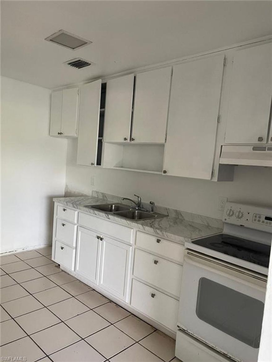 Renovated 2 bedroom unit with impact windows and doors.  plenty of parking.  Centrally located.  Central AC
