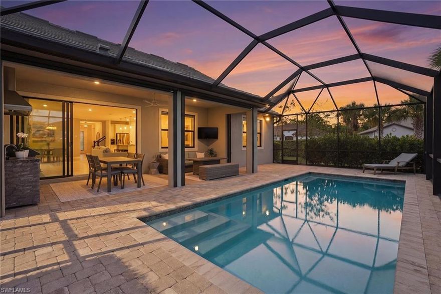 In the exclusive Greyhawk at Golf Club of the Everglades, this one-of-a-kind, expanded Summerwood model is among the largest of its kind in the community, offering nearly 3,000 square feet under air and a rarely available extended first-floor footprint. Built in 2021, this thoughtfully designed residence features three bedrooms plus a den, three full baths, and an impressive upstairs loft retreat complete with a private bedroom and full bath, ideal for guests or multigenerational living. The well-appointed kitchen flows seamlessly into the spacious living and dining areas, creating an open and functional layout ideal for everyday living and entertaining. Impact sliding glass doors lead to an exceptional outdoor space, enhancing the indoor-outdoor lifestyle Southwest Florida is known for. Go outside to the lanai, creating a comfortable outdoor living space. Enjoy the heated pool and entertain with ease, complete with an outdoor kitchen and mini refrigerator. Every detail of this home blends comfort, functionality and style, making it a standout opportunity in Greyhawk. Limited golf/social membership included.