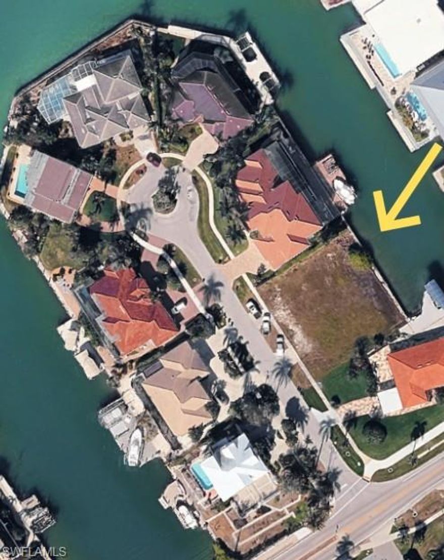 An exceptional opportunity to craft a bespoke waterfront estate in the heart of Marco Island. Tucked away on a quiet cul-de-sac, 1211 Butterfly Court presents a desirable homesite with tranquil water views and direct access potential to the Gulf—an ideal setting for the avid boater and those seeking the ultimate coastal lifestyle. This cleared parcel offers ample space to design and build a custom residence tailored to your vision, with room for expansive indoor-outdoor living, a resort-style pool, and private dockage. Surrounded by established luxury homes, the property enjoys a sense of privacy while remaining just moments from Marco Island’s renowned white-sand beaches, dining, and boutique shopping. A rare offering where location, lifestyle, and possibility converge—ready for you to bring your dream waterfront retreat to life.