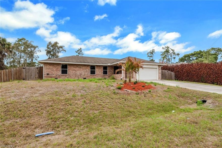 Discover the timeless appeal of this brick home nestled in a peaceful, country-like setting on a quiet street in Southwest Florida. This charming 3-bedroom plus den (easily convertible to a 4th bedroom) offers over 1,800 sqft of refreshed, move-in-ready living space. Step inside to find a bright, open layout with vaulted ceilings and wood-plank tile flooring flowing through the main living areas. The heart of the home is the inviting open kitchen, overlooking the living space so you're always connected to the conversation, complete with durable Corian countertops and wood cabinetry. Recent updates make this home shine: NEW ROOF! Freshly painted interior, new carpet in all bedrooms, beautifully landscaped grounds with irrigation system, serviced septic tank and well equipment, plus thorough maintenance on the AC, plumbing, and electrical systems for peace of mind. A versatile bonus room at the rear adds incredible flexibility. Use it as a cozy family room, home office, den, or easily transform it into that fourth bedroom you've been wanting. Outside, the west-facing backyard is a true highlight: FENCED in with ample space for kids and pets to play, room for a future pool, and plenty of storage for boats, toys, or hobbies, this private oasis invites outdoor enjoyment every day. OVERSIZED lot. Call today for your own private tour!
