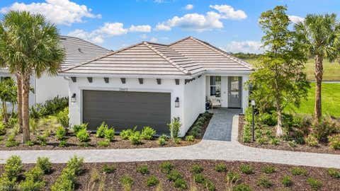 Photo of 26613 Dove DR, PUNTA GORDA, FL 33955 (MLS # 226027928)